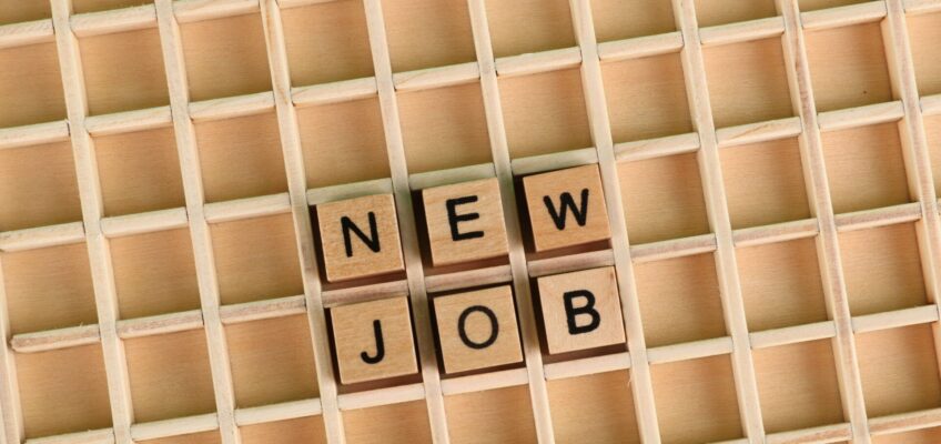 Rechtenvrije afbeelding van de woorden New Job.